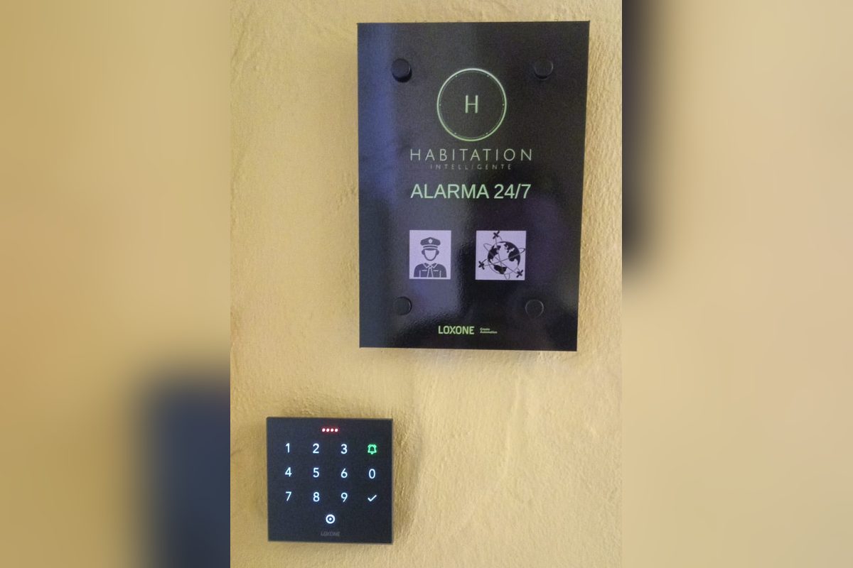 Loxone keypad and alarm plate installed in a private home